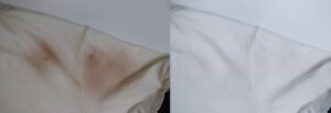 Yellow stained pillowcase vs white cleaned pillowcase showing stain removal results