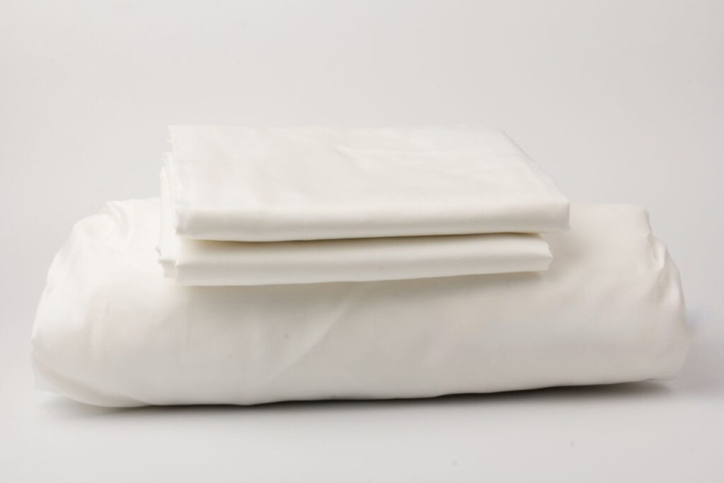 Pillowcase burrito method for storing sheet sets