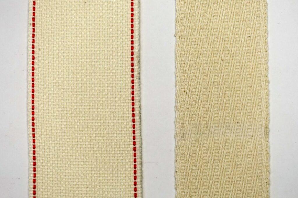 Macro photo comparing Ritz-Carlton's flat French seam (left) vs retail overlock seam